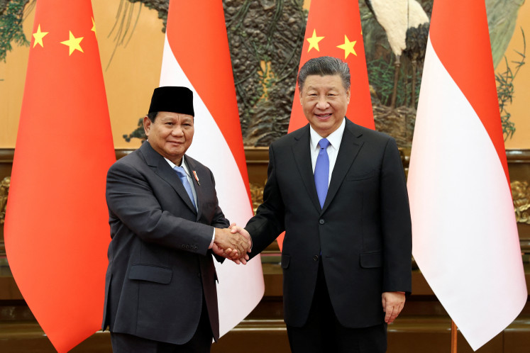 Chinese President Xi Jinping welcomes Defense Minister Prabowo Subianto on April 1, 2024 at the Great Hall of the People in Beijing.