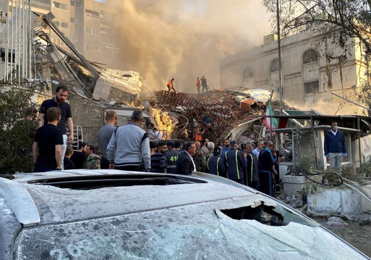 Smoke rises on April 1, 2024, after what the Iranian media said
was an Israeli strike on a building close to the Iranian Embassy in Damascus.
Mohammed Reza Zahedi, Commander of the Quds Force of the Iranian
Revolutionary Guard, was among those killed in the attack.