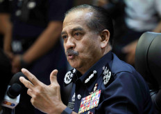 Malaysian Inspector-General of Police Razarudin Husain speaks during a press conference at Kuala Lumpur, Malaysia, April 2, 2024.