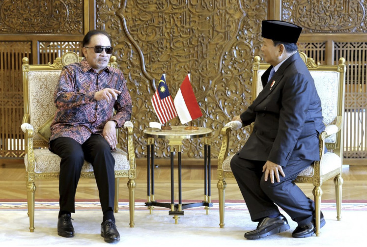 Malaysian Prime Minister Anwar Ibrahim talks with President-elect Prabowo Subianto in Kuala Lumpur, Malaysia on April 4, 2024.