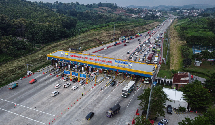 This aerial photo taken on April 3, 2024 shows vehicles lining up at the Kalikangkung toll gate in Semarang-Batang toll road in Semarang, Central Java.