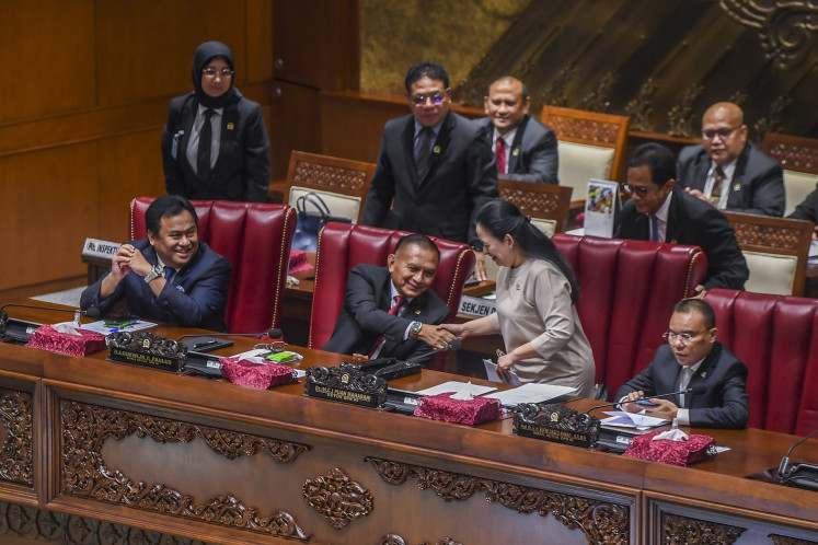 House of Representatives Speaker Puan Maharani (center) with deputy speakers Sufmi Dasco Ahmad (second right), Lodewijk Freidrich Paulus (second left) and Rachmad Gobel (left) wraps up the current sitting session at the Senayan legislative complex in Jakarta on April 4, 2024.