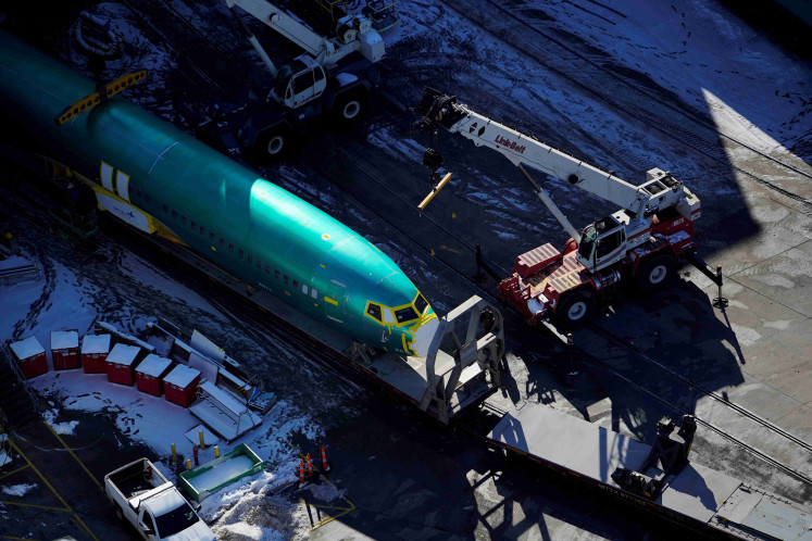 An airplane fuselage for Boeing's 737 Max is unloaded from a rail car at their top supplier, Spirit AeroSystems Holdings Inc, in Wichita, Kansas, US December 17, 2019. 