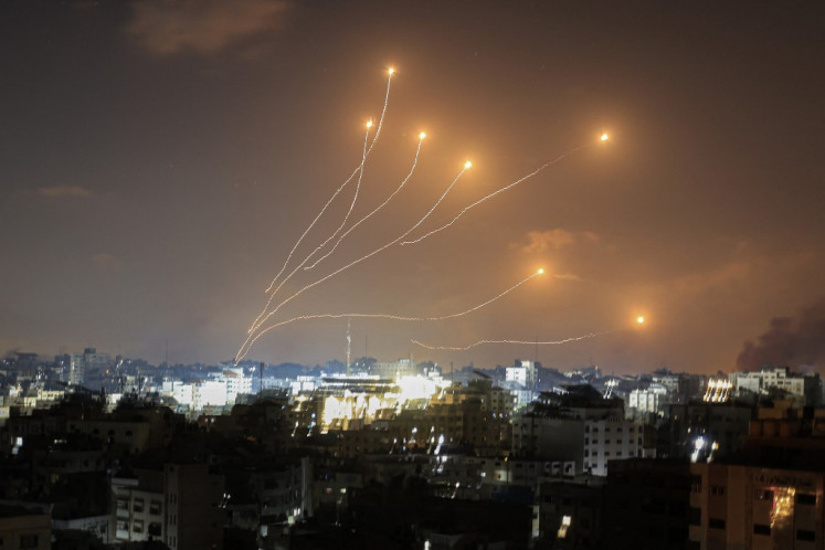 Israel's Iron Dome air defence system intercepts rockets launched from Gaza on October 11, 2023. 