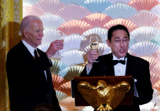 Biden, Japan PM boost defense ties with eye on China