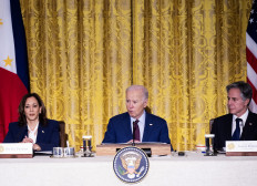US President Joe Biden (center), Secretary of State Antony Blinken (right), and US Vice President Kamala Harris look on during a trilateral meeting with Japanese Prime Minister Fumio Kishida and Filipino President Ferdinand Marcos Jr. in the East Room of the White House in Washington, DC, on April 11, 2024.
