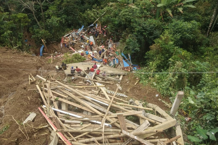 This handout photo released on April 14, 2024 by the National Search and Rescue Agency (BASARNAS) shows a landslide site in Tana Toraja, South Sulawesi. 