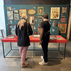 Reflections: Two visitors look at reverse glass paintings displayed on March 1 in the Cerita Kaca (Glass Story) exhibit at Dia.Lo.Gue Artspace in Kemang, South Jakarta. The exhibition runs until April 19.