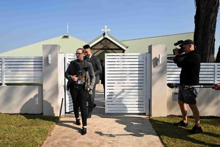 Police leave the Assyrian Christ The Good Shepherd Church after a knife attack took place during a service the night before, in Wakely in Sydney, Australia, April 16, 2024.