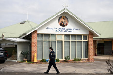 Police investigate the Assyrian Christ The
Good Shepherd Church in Wakely, Sydney, Australia, on
April 16, 2024, after a knife attack took place there during a service
the night before.