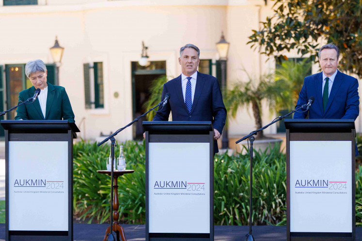 Australia's Foreign Minister Penny Wong, Defense Minister Richard Marles and Britain's Foreign Secretary David Cameron at Government House for the annual Australia-UK Ministerial Consultations (AUKMIN), in Adelaide, Australia March 22, 2024. 