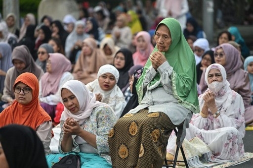 Festive day: Elderly women join Idul Fitri prayers, marking the end of the holy month of Ramadan, in Surabaya, East Java, on April 10, 2024.