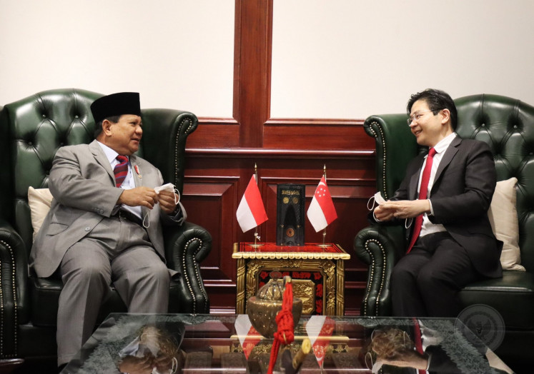 Indonesian Defense Minister Prabowo Subianto (left) received visiting Singaporean Finance Minister Lawrence Wong at the Defense Ministry in Jakarta on May 17, 2023.