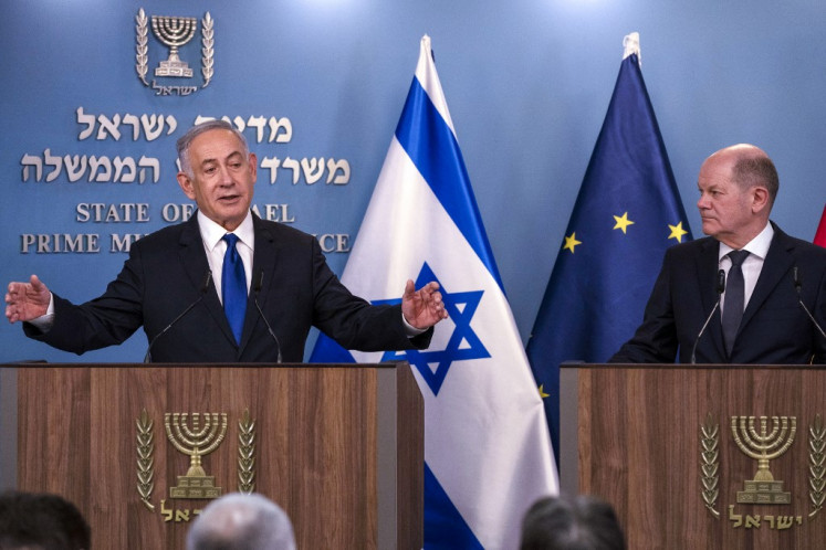 Israeli Prime Minister Benjamin Netanyahu (left) speaks during a joint press conference with German Chancellor Olaf Scholz following their meeting in Jerusalem on March 17, 2024. 