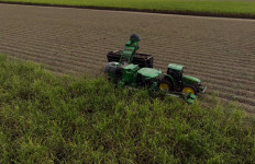 A combine harvester cuts sugarcane on Oct. 10, 2023, in Kaplan, Louisiana, the United States.