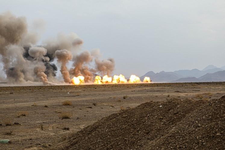A handout picture provided by the Iranian Army media office on October 28, 2023 shows fireballs erupting during a military drill in the Isfahan province in central Iran. (Photo by Iranian Army office 