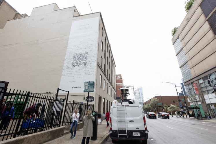 A general view of a mural for Taylor Swift's “The Tortured Poets Department“ on the side of a building as Taylor Swift murals pop up in various cities on April 18, 2024 in Chicago, Illinois.   