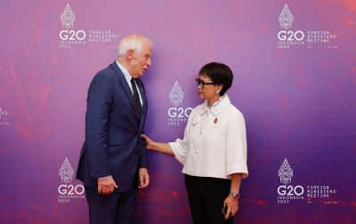 Foreign but familiar: Indonesian Foreign Minister Retno LP Marsudi (right) welcomes European Union Foreign Policy chief Josep Borrell during the Group of 20 Foreign Ministers Meeting in Nusa Dua on the resort island of Bali on July 8, 2022.