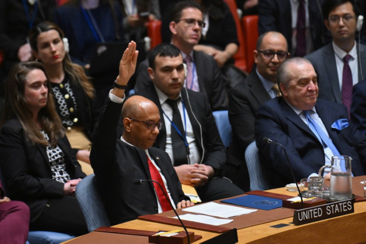 United States Deputy Ambassador to the United Nations Robert Wood votes against a resolution allowing Palestinian UN membership at UN headquarters in New York, the United States, on April 18, 2024, during a UN Security Council meeting on the situation in the Middle East, including the Palestinian question. The draft resolution, which was introduced by Algeria and “recommends to the General Assembly that the State of Palestine be admitted to membership of the United Nations,“ received 12 votes in favor, two abstentions and one against.