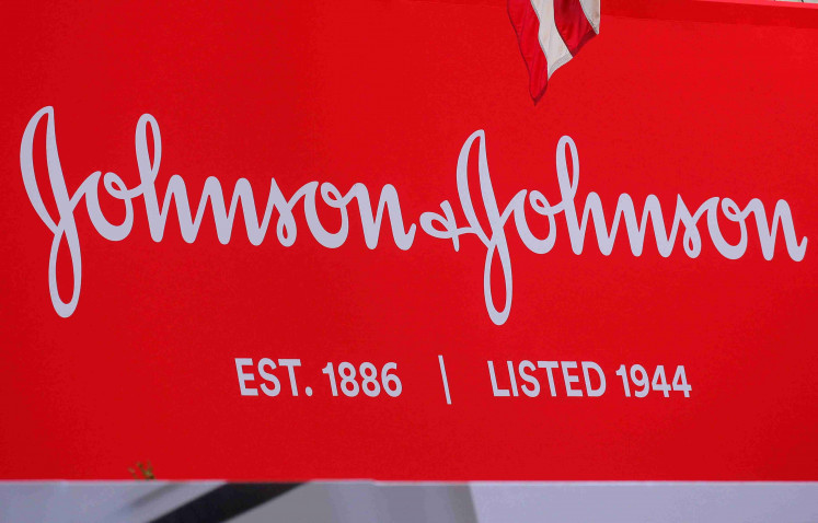 The company logo for Johnson & Johnson is displayed to celebrate the 75th anniversary of the company's listing at the New York Stock Exchange (NYSE) in New York, US, September 17, 2019. 