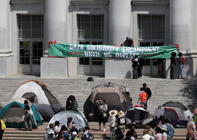 Pro-Palestinian protesters set up a tent encampment in front of Sproul Hall on the UC Berkeley campus on April 22, 2024 in Berkeley, California. 