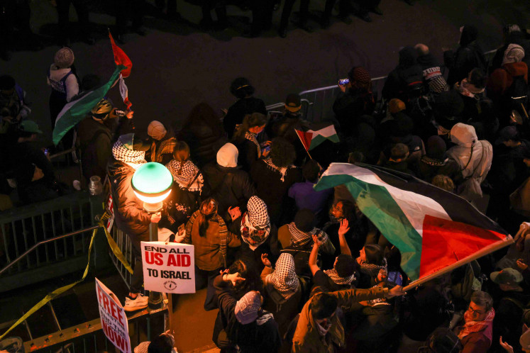 Demonstrators face off with NYPD officials as they stand in solidarity with the ongoing protests in support of Palestinians happening on the Columbia University campus, during the ongoing conflict between Israel and the Palestinian Islamist group Hamas, in New York City, US, April 24, 2024.