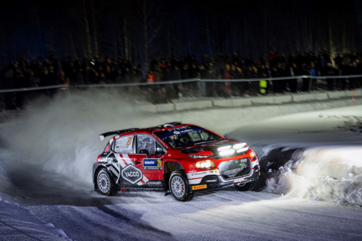 Nikolay Gryazin of Bulgaria and his codriver Konstantin Aleksandrov steer their Citroen C3 on Feb. 15, 2024, during the Umea Sprint 1, the first stage of the Rally Sweden and second round of the FIA World Rally Championship, in Umea, Sweden. 