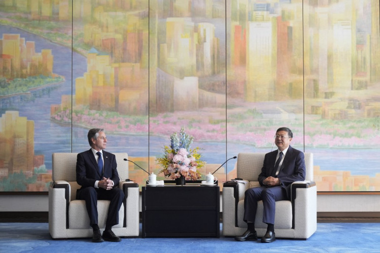 US Secretary of State Antony Blinken (left) talks with Shanghai Party Secretary Chen Jining during a meeting at the Grand Halls in Shanghai on April 25, 2024. 