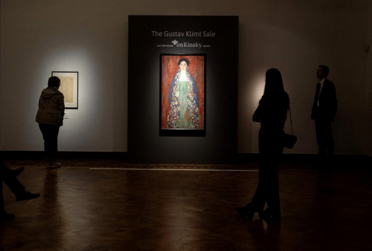 Visitors are viewing the rediscovered painting of a young female  'Portrait of Miss Lieser' by Austrian painter Gustav Klimt.