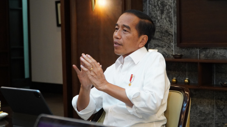 President Joko “Jokowi“ Widodo talks to journalists from The Jakarta Post during an interview at the Presidential Palace in Jakarta on Nov. 2. 