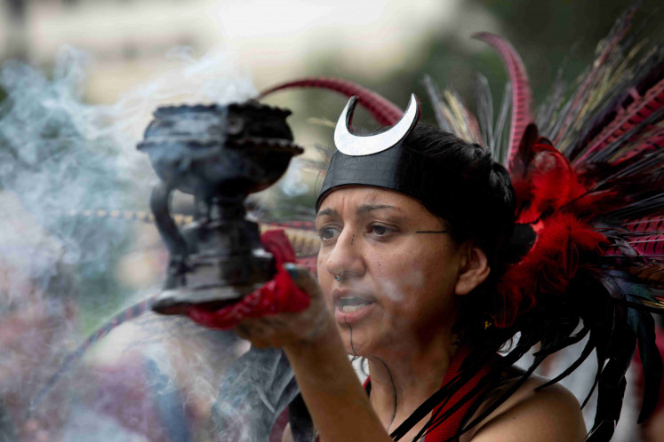 A supporter of pro-Palestinian protesters takes part in a vigil outside the Travis County Jail waiting for the release of the protesters detained at the University of Texas, during the ongoing conflict between Israel and the Palestinian Islamist group Hamas, in Austin, Texas, US April 30, 2024. 