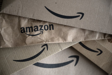 The logo of e-commerce company Amazon is pictured on parcels in Manta, Northwestern Italy, on April 29, 2024.