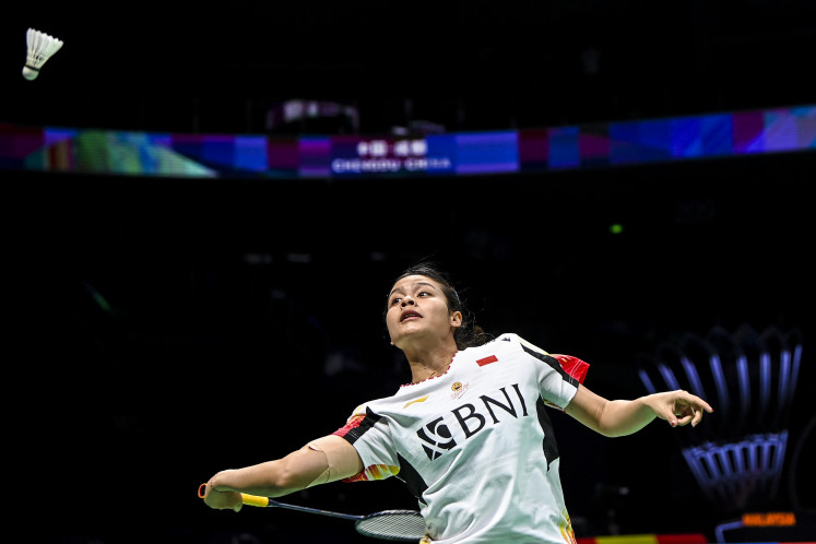Indonesia’s badminton singles player Komang Ayu Cahya Dewi faces
off Japan’s Tomoka Miyazaki (not pictured) on May 1, 2024, during an Uber Cup
2024 elimination match at Chengdu Hi Tech Zone Sports Center Gymnasium in
Chengdu, China. Komang Ayu beat Miyazaki 21-12, 14-21, 21-13, placing
Indonesia as the runner-up in Group C.