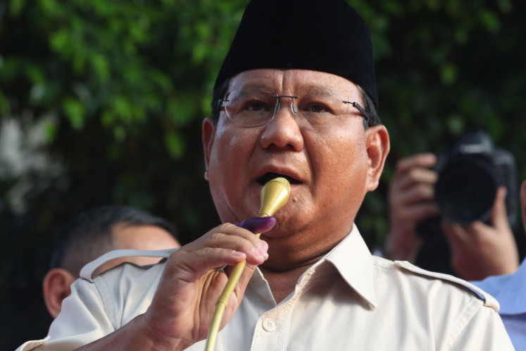 Presidential candidate Prabowo Subianto claims victory at his house in Jakarta on April 17, just hours after polling stations closed nationwide. 