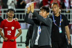 Indonesia's South Korean coach Shin Tae-yong salutes the audience after the U23 AFC Qatar 2024 Asian Cup third-place match between Iraq and Indonesia at Abdullah Bin Khalifa Stadium in Doha on May 2, 2024.