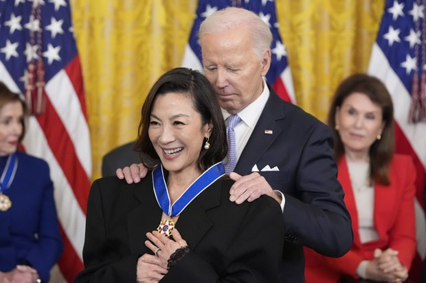 US President Joe Biden awards the nation’s highest civilian honor, the Presidential Medal of Freedom, to Malaysia-born actress Michelle Yeoh during a ceremony in the East Room of the White House in Washington, May 3, 2024.