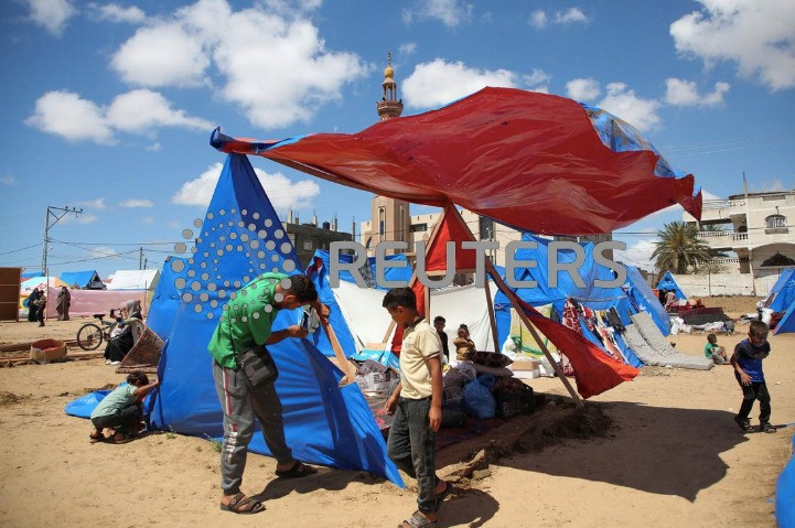 Sent packing: A displaced Palestinian dismantles a tent after the Israeli military warned Palestinian civilians to evacuate ahead of a threatened assault on Rafah, amid the ongoing conflict between Israel and Hamas, in Rafah, in the southern Gaza Strip on May 6, 2024. 