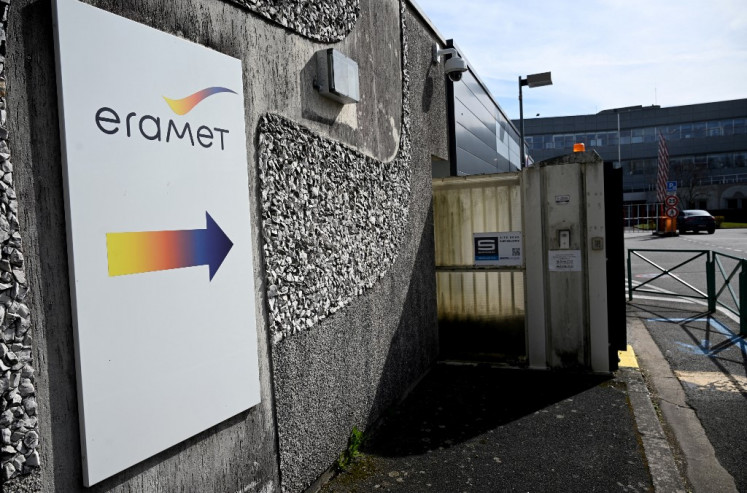 A photo shows the logo of French mining and metallurgy group Eramet at the entrance to its headquarters in the Paris suburb of Trappes in France on March 16, 2023. 