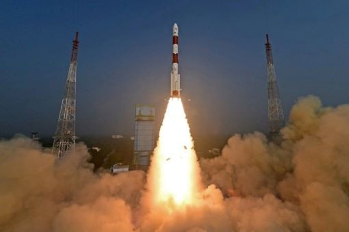 Smoking blastoff: The PSLV-C58 rocket, carrying the X-ray Polarimeter Satellite (XPoSat), lifts off on Jan. 1 from Satish Dhawan Space Center in Sriharikota, India.