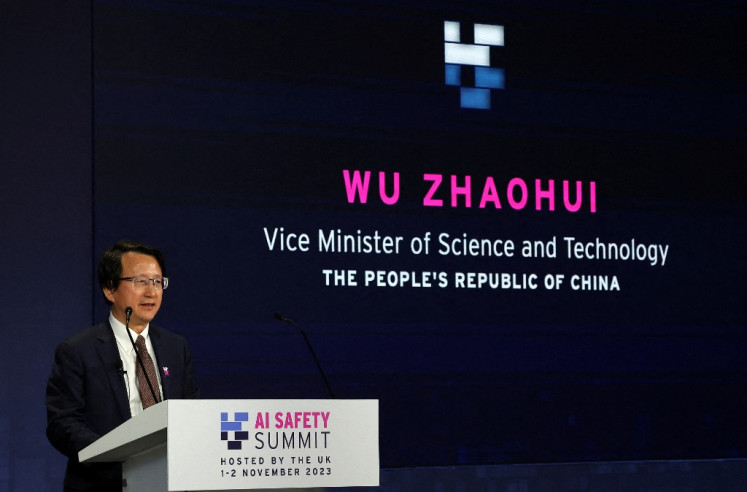 China's Vice-Minister, Ministry of Science and Technology Wu Zhaohui speaks during the UK Artificial Intelligence (AI) Safety Summit at Bletchley Park, in central England, on November 1, 2023. 