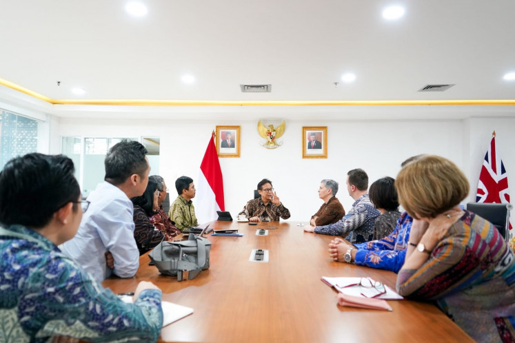 Health Minister Budi Gunadi Sadikin (center) speaks with companies involved in the development of synthetic antibiotics, a new technology that aims to address increased antibiotic resistance, in Jakarta in January 2024.