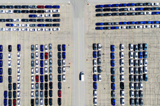 Honda vehicles sit parked on April 25, 2024, at
the company's automotive assembly plant in Alliston,
Ontario, Canada, after Honda announced plans to build
electric vehicles and their parts in Ontario with financial
support from the Canadian and provincial governments.