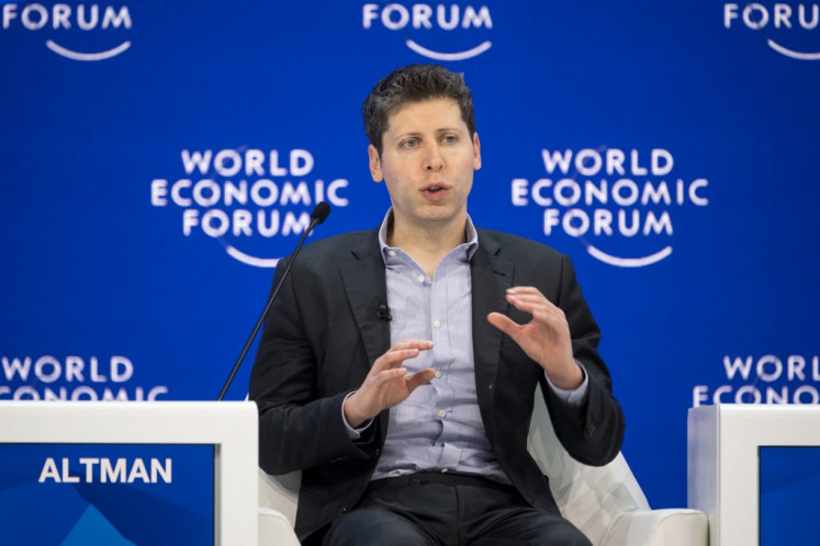 OpenAI CEO Sam Altman gestures during a session of the World Economic Forum (WEF) meeting in Davos on Jan. 18, 2024.