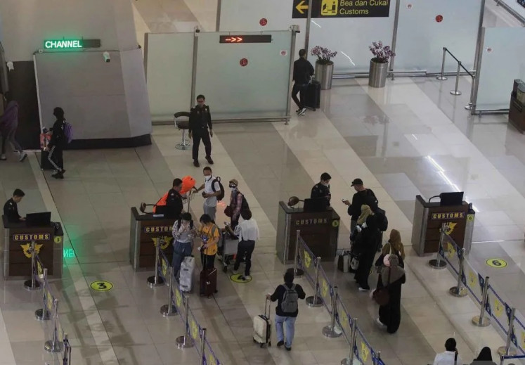 Routine procedure: International arrivals go through customs on May 6, 2024 in Terminal 3 at Soekarno-Hatta International Airport in Tangerang, Banten. Criticism is mounting over authorities taking action only after public complaints have gone viral over problematic policies.