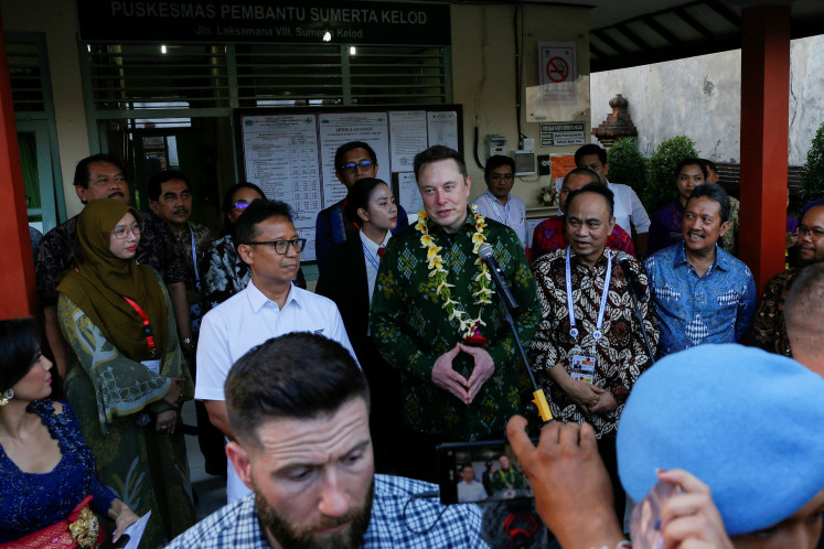 Elon Musk, chief executive officer of SpaceX and Tesla, accompanied by Health Minister Budi Gunadi Sadikin, Communication and Information Technology Minister Budi Arie Setiadi and Fisheries Minister Sakti Wahyu Trenggono, speaks to media during the launching of SpaceX's Starlink internet service in Indonesia at a community health center in Denpasar, Bali, May 19, 2024. 