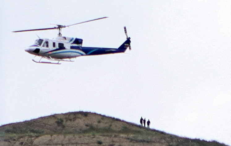A helicopter carrying Iranian President Ebrahim Raisi takes off on May 19, 2024 from an area near the country’s border with Azerbaijan. The aircraft later “made a hard landing” in bad weather, according to state media.