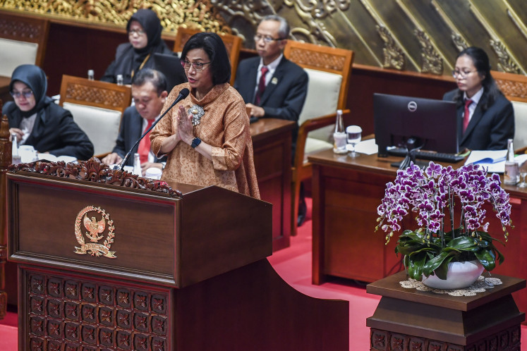 Finance Minister Sri Mulyani Indrawati speaks about fiscal policy on May 20, 2024 at a House of Representatives plenary session in Jakarta.