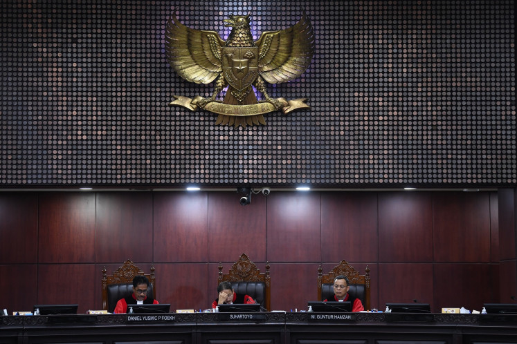 A panel of three Constitutional Court justices presides on May 23, 2024, over a legislative election dispute hearing at the court building in Jakarta.