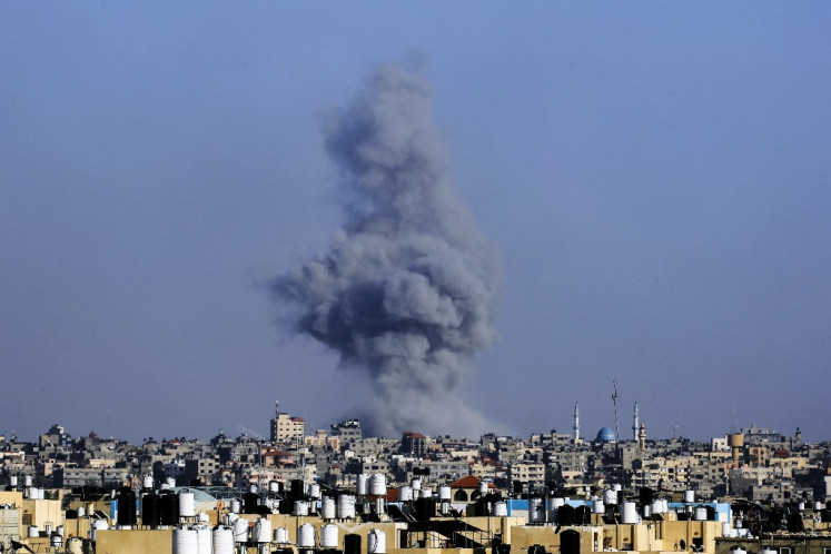 Smoke billows following Israeli bombardment in Rafah, in the southern Gaza Strip, on May 25, 2024, amid the ongoing conflict between Israel and the Palestinian militant group Hamas. 
