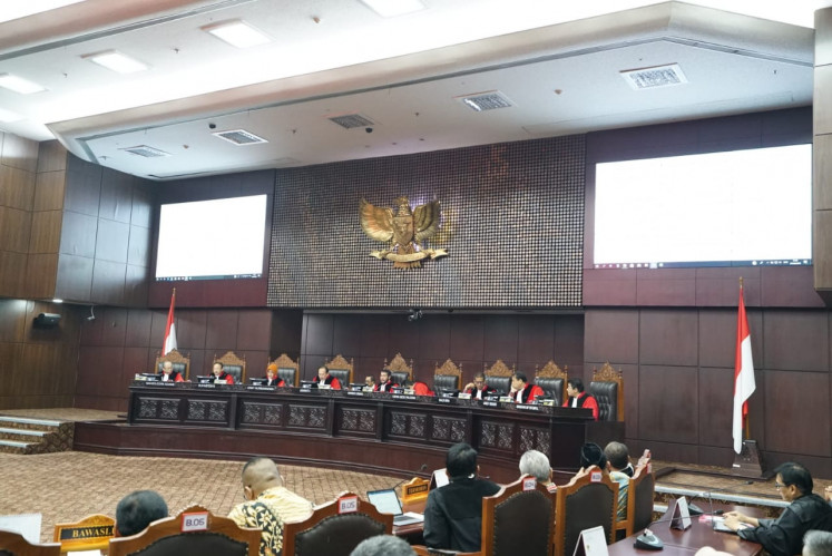 Justices of the Constitutional Court lead a hearing on the 2019 general and presidential elections at the court in Central Jakarta on June 27. 
